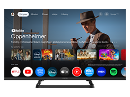 Flachbildfernseher mit Startbildschirm verschiedener Streaming-Apps und Filmauswahl.