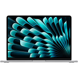Silberner Laptop mit blau-schwarzem Muster auf dem Bildschirm, zentral positioniert und frontal aufgenommen.