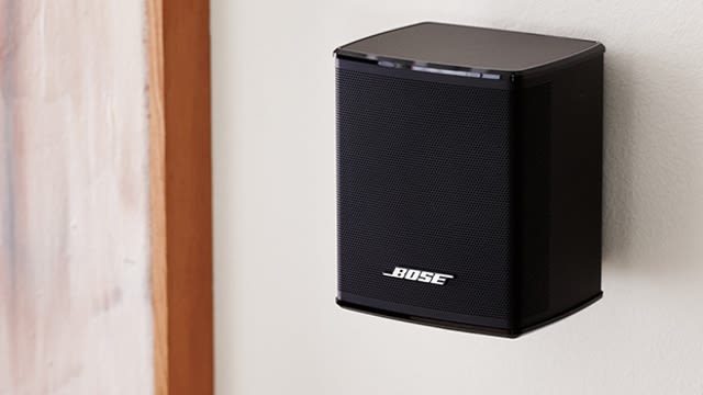 Erweiterung des Systems um das Bass Module 500 und Surround Speaker