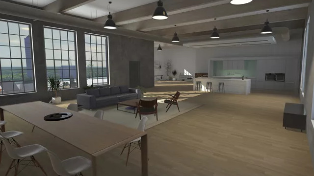 Ein heller Raum mit Holzboden, Fenstern, einer grauen Couch, Stühlen, einem Tisch und einer Küchenzeile im Hintergrund.