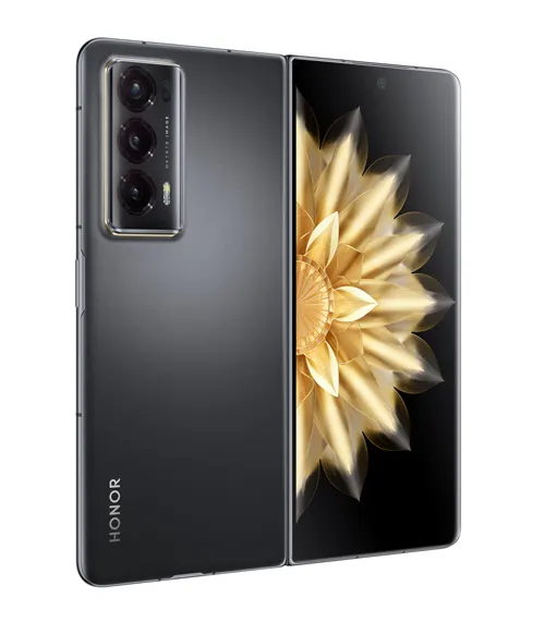 Telefono pieghevole grigio con tripla fotocamera e display con fiore dorato su sfondo nero.