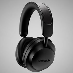 Cuffie nere su sfondo grigio chiaro. Design over-ear con archetto imbottito e padiglioni auricolari rotondi.