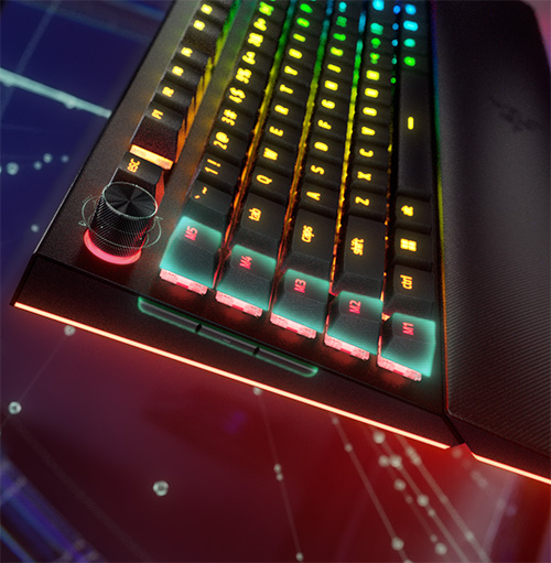 Tastiera nera retroilluminata con tasti colorati e manopola metallica. Sfondo sfumato rosso e blu con elementi grafici bianchi.