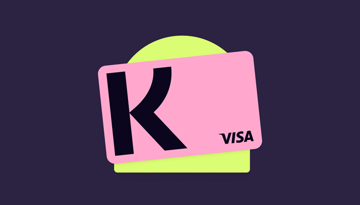 Carta rosa con "K" nera su cerchio giallo su sfondo viola. Logo Visa in basso a destra.