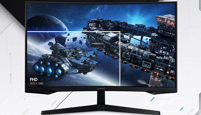 Monitor nero su supporto nero, che mostra immagini di astronavi in spazio blu. Testo FHD 1920x1080 in basso a sinistra.