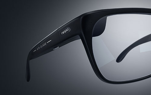 Occhiali da vista neri con marchio "OPPO" su sfondo grigio sfumato.