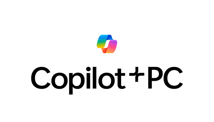 Logo "Copilot+PC" in nero su sfondo bianco. Sopra, simbolo multicolore a forma di nastro.