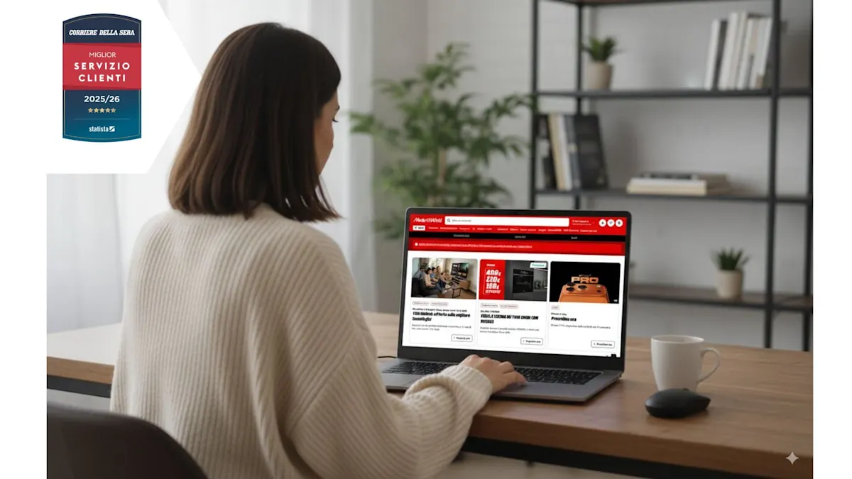 Mani che usano un laptop e uno smartphone per navigare su un sito web con scritte rosse su sfondo bianco. Premi aziendali sullo sfondo.