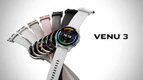Diversi orologi Venu 3 con cinturini colorati disposti a ventaglio su sfondo bianco. L'orologio in primo piano � bianco.