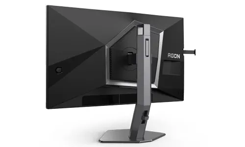 Vista posteriore di un monitor nero con supporto grigio su sfondo bianco.