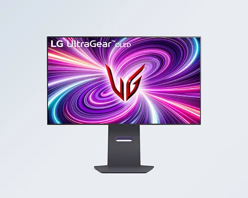 Monitor LG UltraGear OLED su supporto grigio. Lo schermo mostra un motivo astratto viola, rosa e blu.