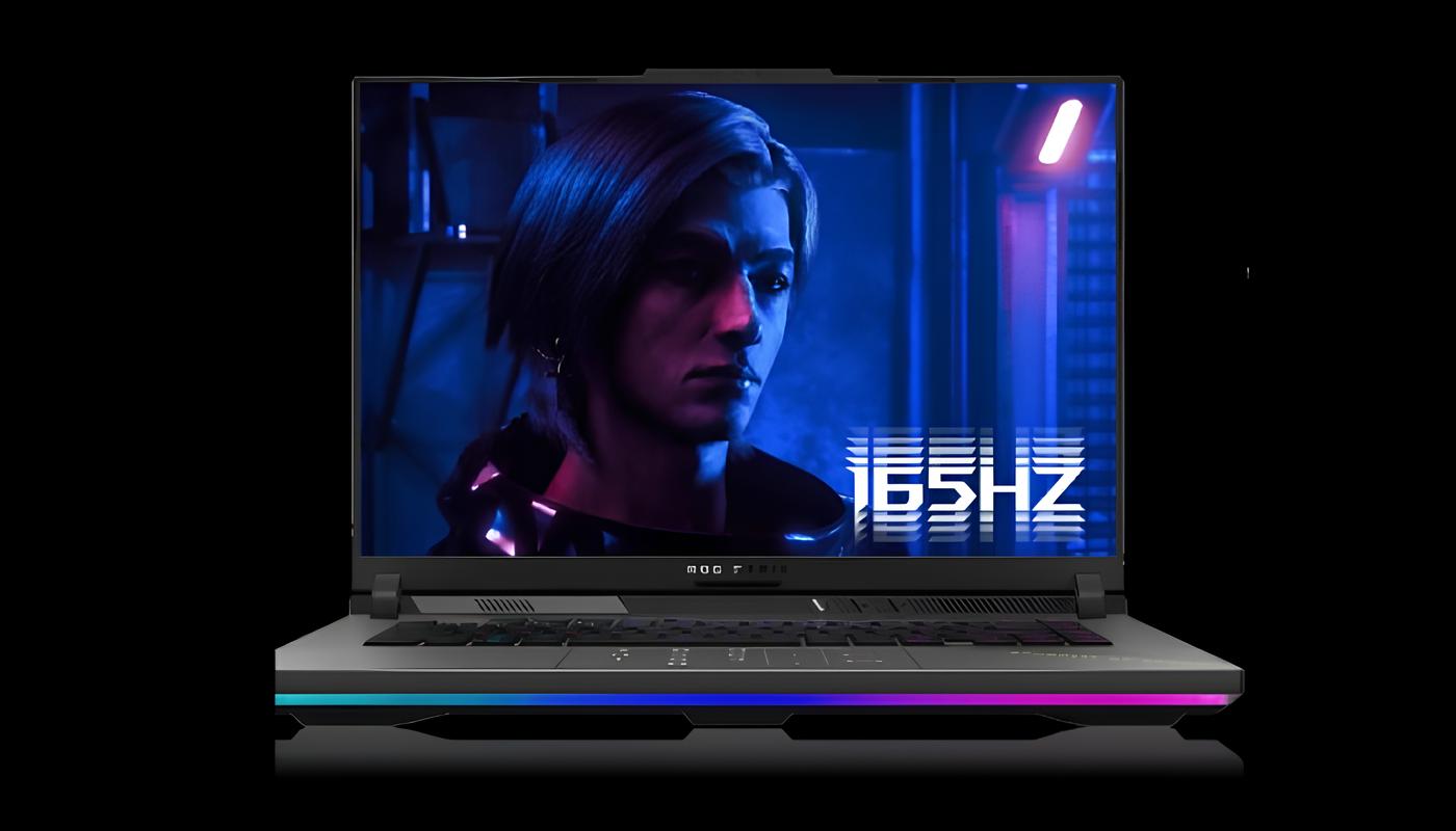 unportatile acceso su sfondo nero. Sullo sfondo del portatile si vede il viso di un personaggio  di un videogioco