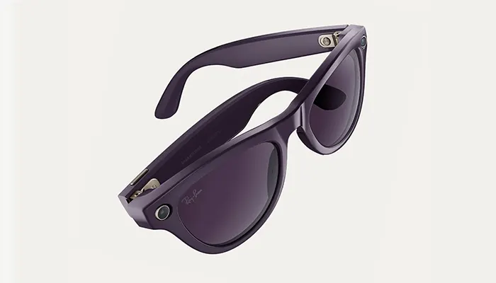 occhiali ray ban meta neri su sfondo rosa