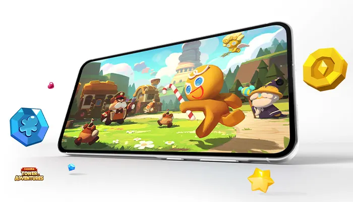 Un cellulare mostra un videogioco con personaggi animati, tra cui un uomo di pan di zenzero, su uno sfondo di campagna.