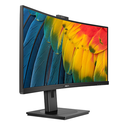 Schermo curvo nero su supporto, con sfondo di piume blu, gialle e rosse.