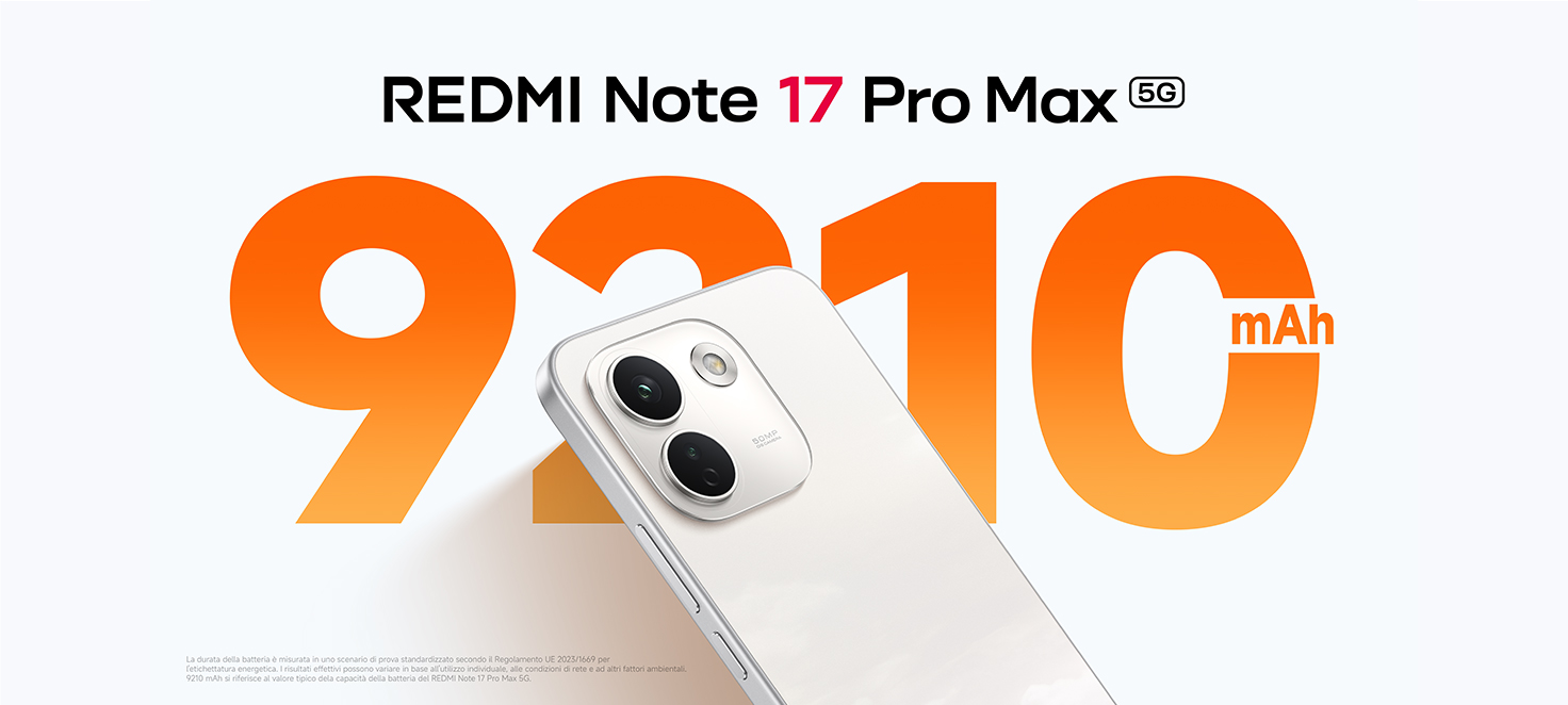 Immagine pubblicitaria dello smartphone Redmi Note 17 Pro Max 5G di colore bianco, con la scritta arancione "9210 mAh" a indicare la capacità della batteria.