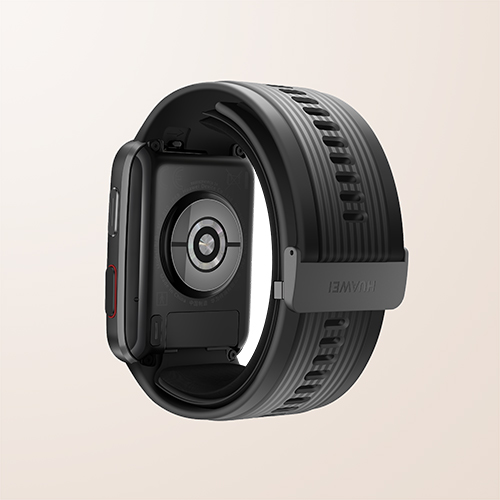 Orologio digitale nero con cinturino in gomma su sfondo neutro. Il sensore � visibile sul retro.