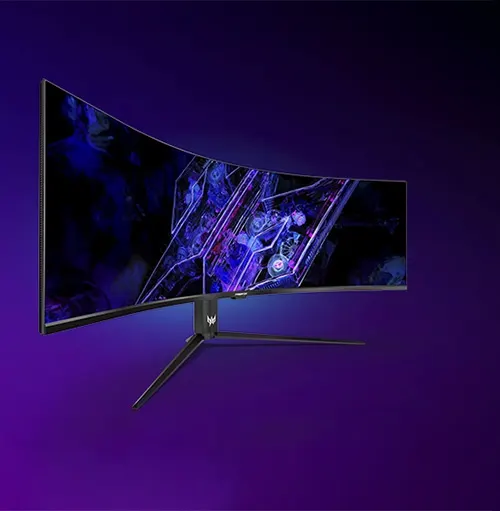 Monitor curvo nero su supporto a V, con sfondo viola e grafica geometrica blu sullo schermo.