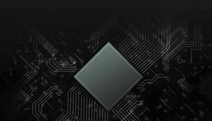 Un chip quadrato grigio � al centro di un circuito su sfondo nero. Le linee del circuito sono bianche e dettagliate.