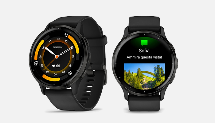 Due orologi neri mostrano un quadrante analogico e una notifica con un'immagine di un ponte.