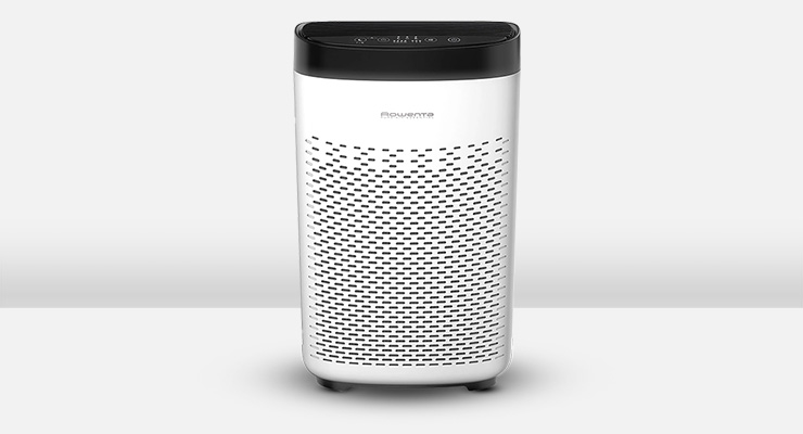 Un purificatore d'aria bianco con dettagli neri e fori per la ventilazione � su uno sfondo bianco.