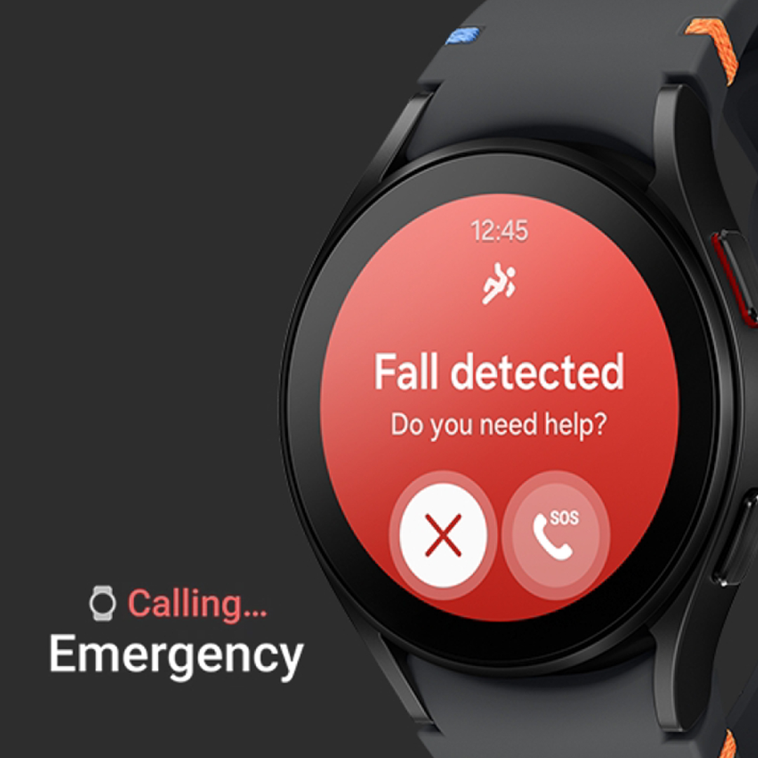 Orologio digitale con schermo rosso che mostra "Caduta rilevata. Hai bisogno di aiuto?", con pulsanti "X" e "SOS". In basso, "Chiamata... Emergenza".