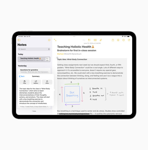 Tablet nero su sfondo bianco, schermo diviso tra menù note e pagina con testo e diagrammi su salute olistica.