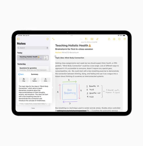 Tablet nero su sfondo bianco, schermo diviso tra menù note e pagina con testo e diagrammi su salute olistica.