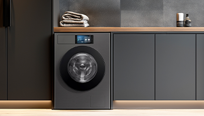 lavatrice su sfondo rosa