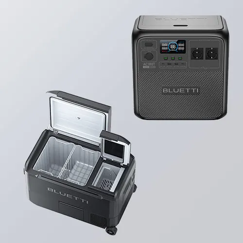 Frigorifero portatile nero aperto con divisori e una power station nera con display su sfondo grigio.