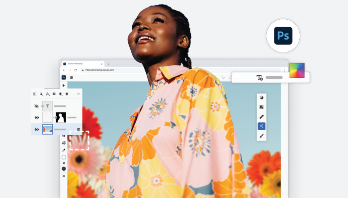 Una donna guarda in alto, su uno schermo di computer aperto con un'immagine floreale e icone di modifica di Adobe Photoshop.