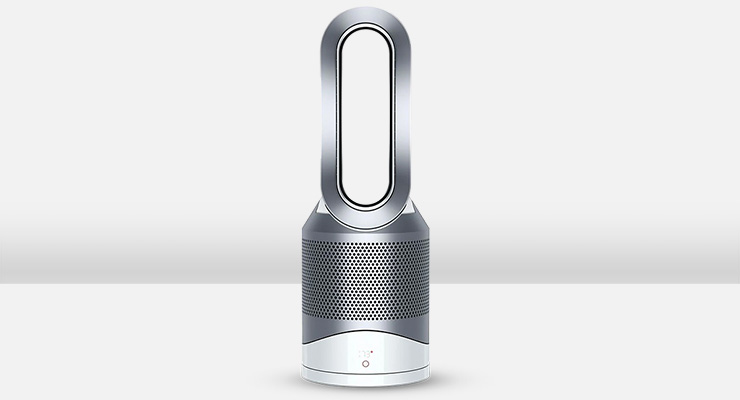 Ventilatore cilindrico argentato con base bianca su sfondo grigio chiaro.