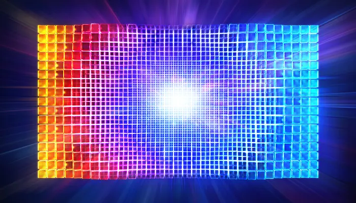 Griglia rettangolare con quadrati colorati che sfumano da giallo e rosso a blu, convergendo verso un punto luminoso centrale.