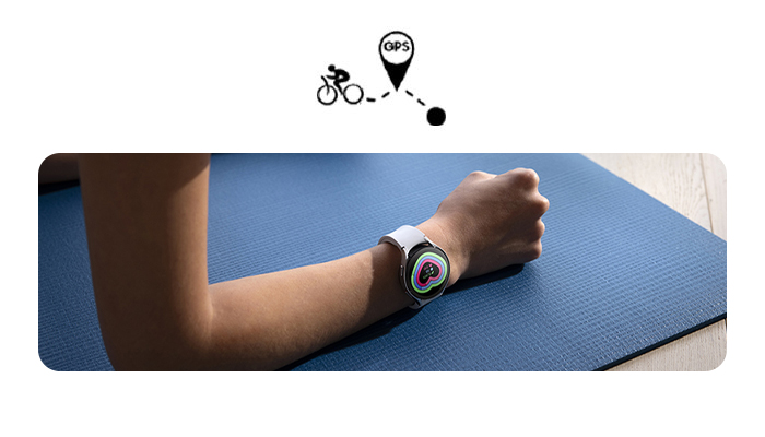 Braccio con smartwatch su tappetino blu, che mostra un'icona a forma di cuore. Icona con ciclista e segnale GPS.