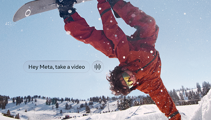 uomo fa ice ski nella neve indossa degli occhiali oakley e vicino a lui un prompt "hey meta take a video"