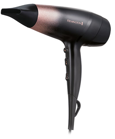 Asciugacapelli nero e bronzo con marchio Remington su sfondo bianco. L'asciugacapelli � in posizione verticale, con beccuccio.