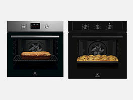 due forni aperti con cibo dentro