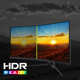 schermo curvato mag con un tramonto sullo sfondo