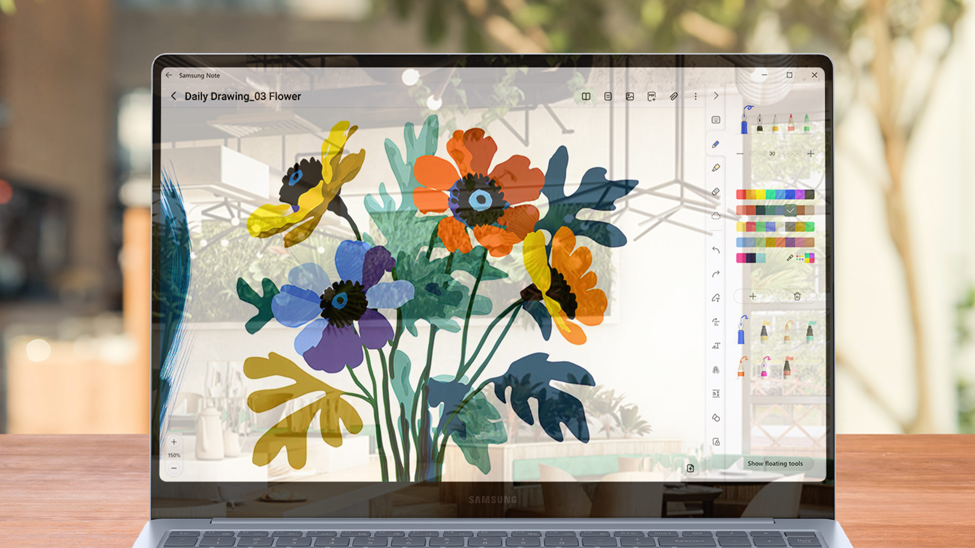 Un laptop mostra un disegno digitale di fiori arancioni, gialli e blu, con una barra degli strumenti per il disegno digitale.
