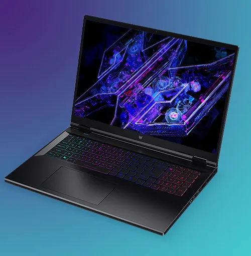 Un portatile aperto mostra uno schermo con grafica blu e viola. La tastiera � retroilluminata con colori diversi.