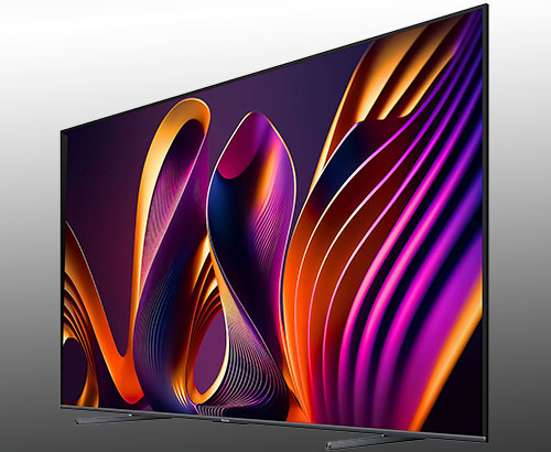 Schermo TV con motivo astratto viola, blu e arancione su sfondo grigio chiaro.