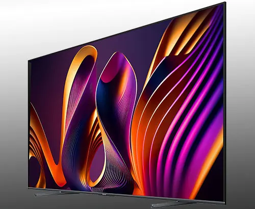 Schermo TV con motivo astratto viola, blu e arancione su sfondo grigio chiaro.