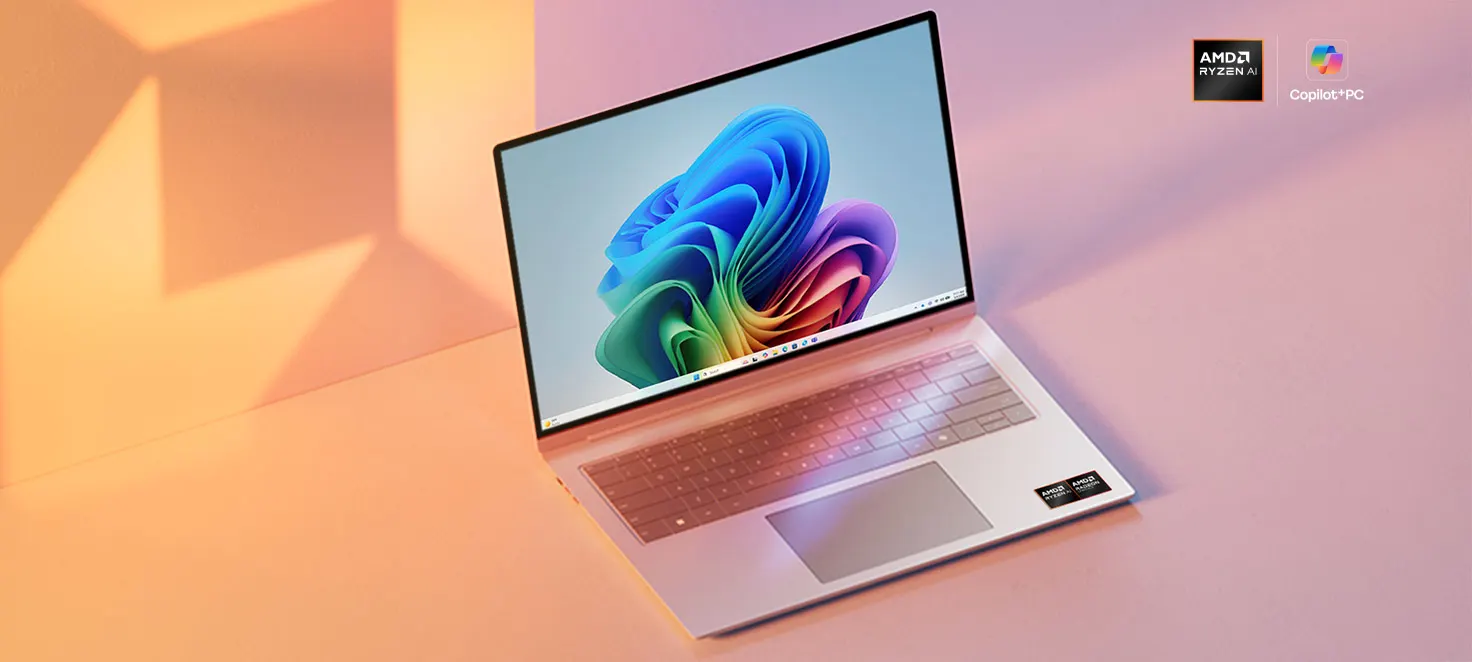 Un notebook su sfondo arancione e rosa