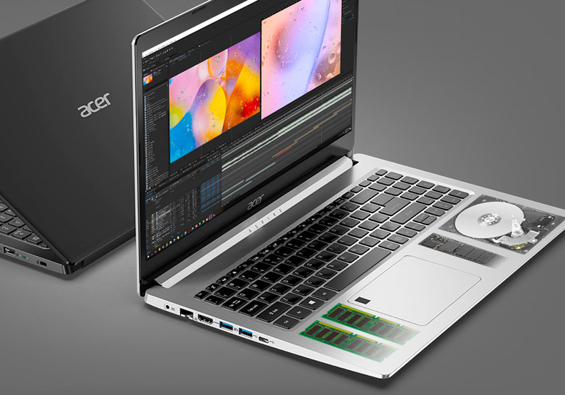 Due computer portatili Acer su sfondo grigio. Uno aperto mostra schermo con immagini colorate, tastiera e componenti interni.