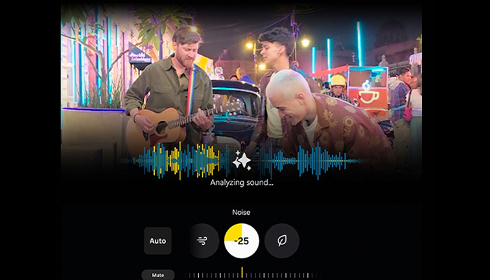 Tre persone in strada, una con chitarra. Interfaccia software con opzioni audio e testo "Analisi del suono".