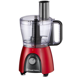 Robot da cucina rosso e nero con contenitore trasparente, con manico nero e pulsante frontale su sfondo bianco.