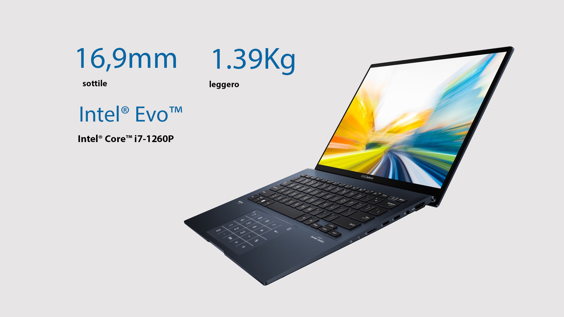 Un portatile ASUS Zenbook aperto mostra uno schermo con grafica astratta colorata. A sinistra, testo blu indica "16,9mm sottile" e "1.39Kg leggero".