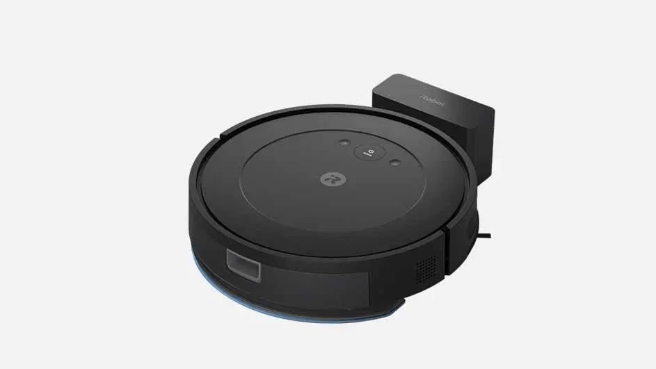 De iRobot Roomba Combo Essential robotstofzuiger is een compacte, ronde schoonmaakhulp met eenvoudig bedieningspaneel bovenop en oplaadstation, ideaal voor automatische stofzuigbeurten in huis.