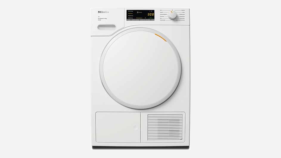 A white Miele tumble dryer with a large round door, digital display, and control knob is shown on a plain background, ready for drying.