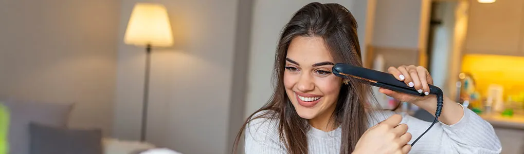 Haar krullen met een stijltang? Volg dit stappenplan